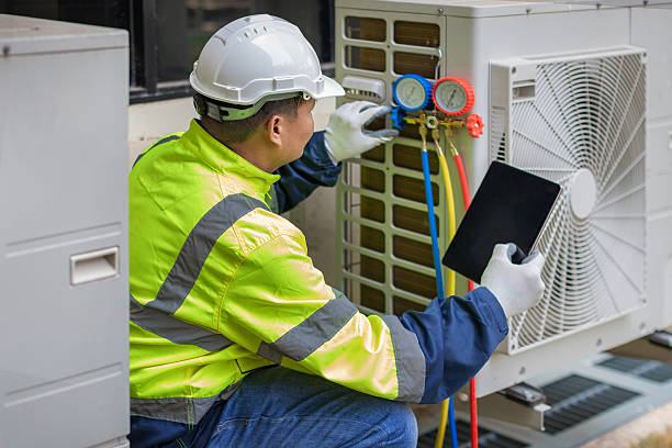 Professional Air Duct Cleaning technician working in Austin, IN